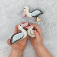 Load image into Gallery viewer, Nom Handcrafted Pelican Chick - Cheeky Junior