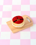 Load image into Gallery viewer, Tara Treasures - Felt Christmas Donut Red Santa's Belly Icing
